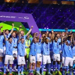 Logo Manchester City dan bendera Uni Emirat Arab