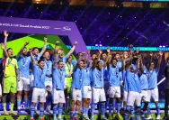 Logo Manchester City dan bendera Uni Emirat Arab