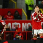 Pemain Manchester United tampak kecewa di lapangan usai laga melawan Tottenham Hotspur