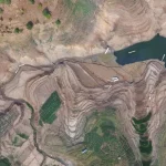Pemandangan dasar Waduk Jatigede yang mengering akibat musim kemarau panjang