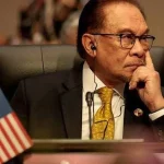 Perdana Menteri Malaysia Anwar Ibrahim menyampaikan rencana kenaikan upah minimum nasional